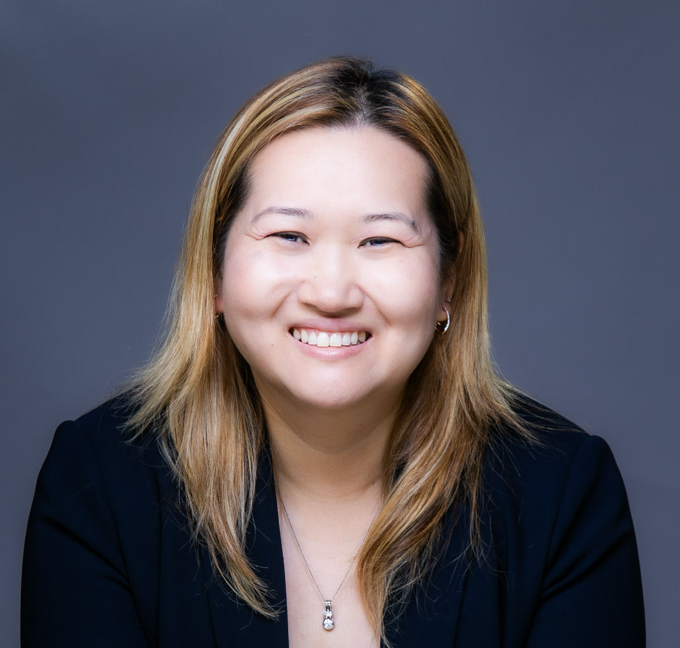 Headshot of Andi Choi, Senior Vice President, Finance & Administration