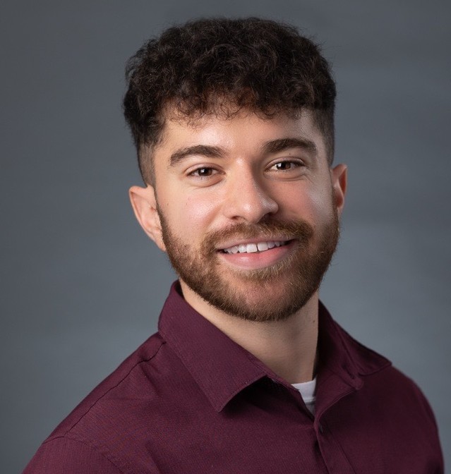 headshot of Tyler Houvener, Project & Office Operations Manager